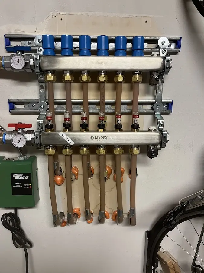 Plumber performing Water Heater Repair at a residential property in Chehalis